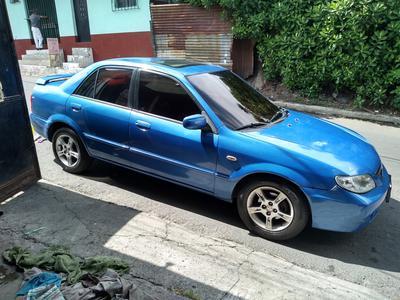 Mazda 323 • 2003 • 210,000 km